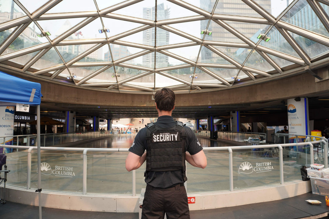 Blackbird security guard standing at Robson Square atrium