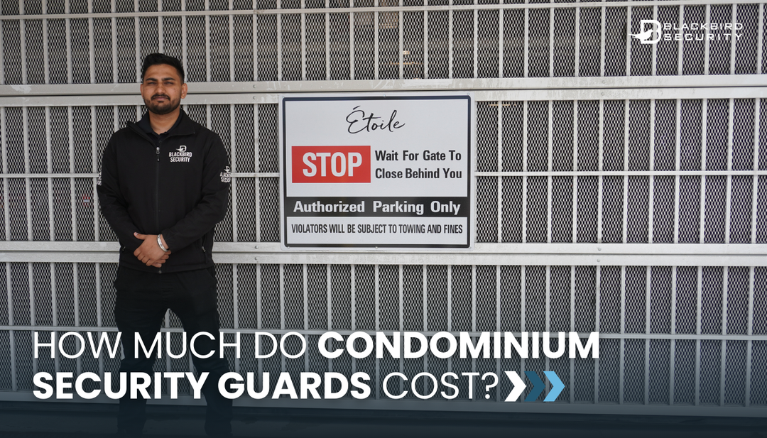 A condo security guard stands in front of a parking garage gate