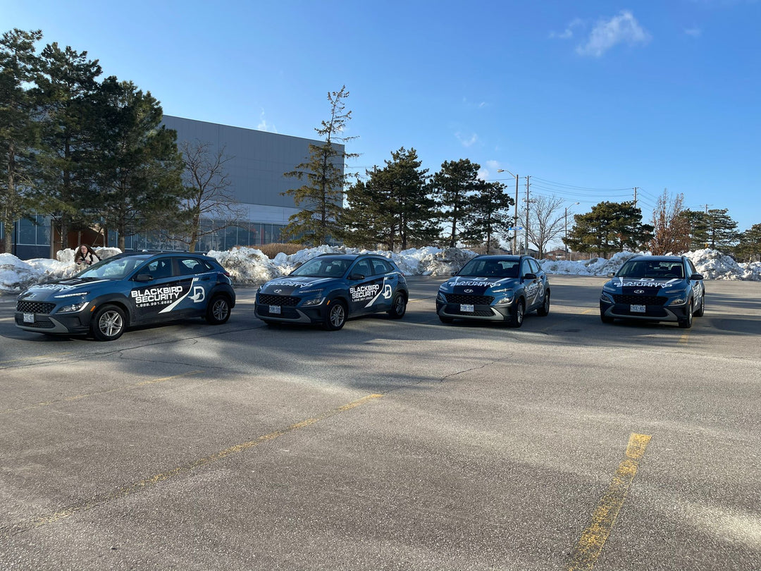 Four Blackbird Security Mobile patrol cars