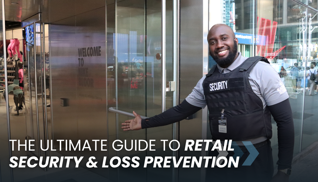 A security guard holding the door to a retail store open for the camera while smiling.