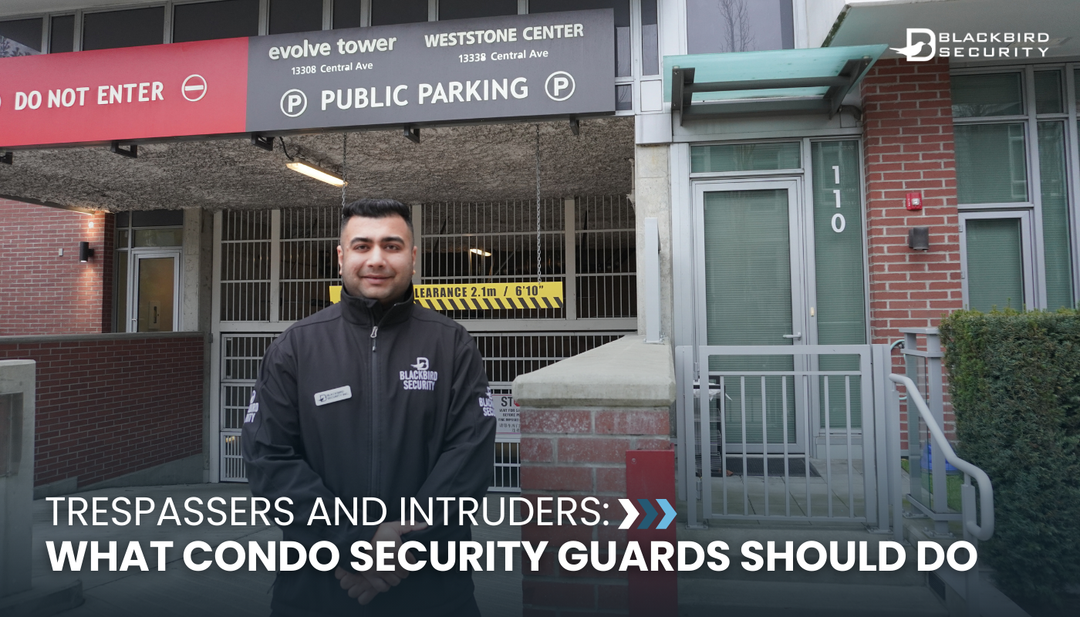 Security guard standing in front of a townhome parkade gate.