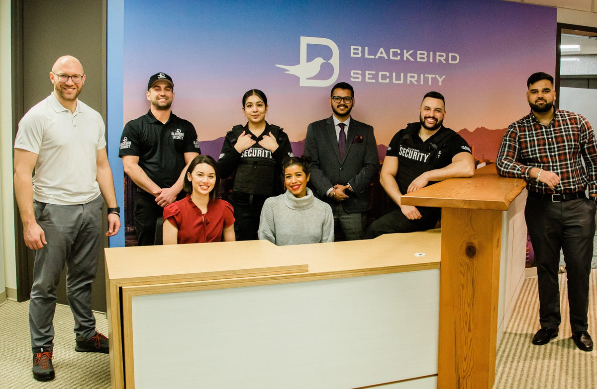 Blackbird security team in front of reception desk