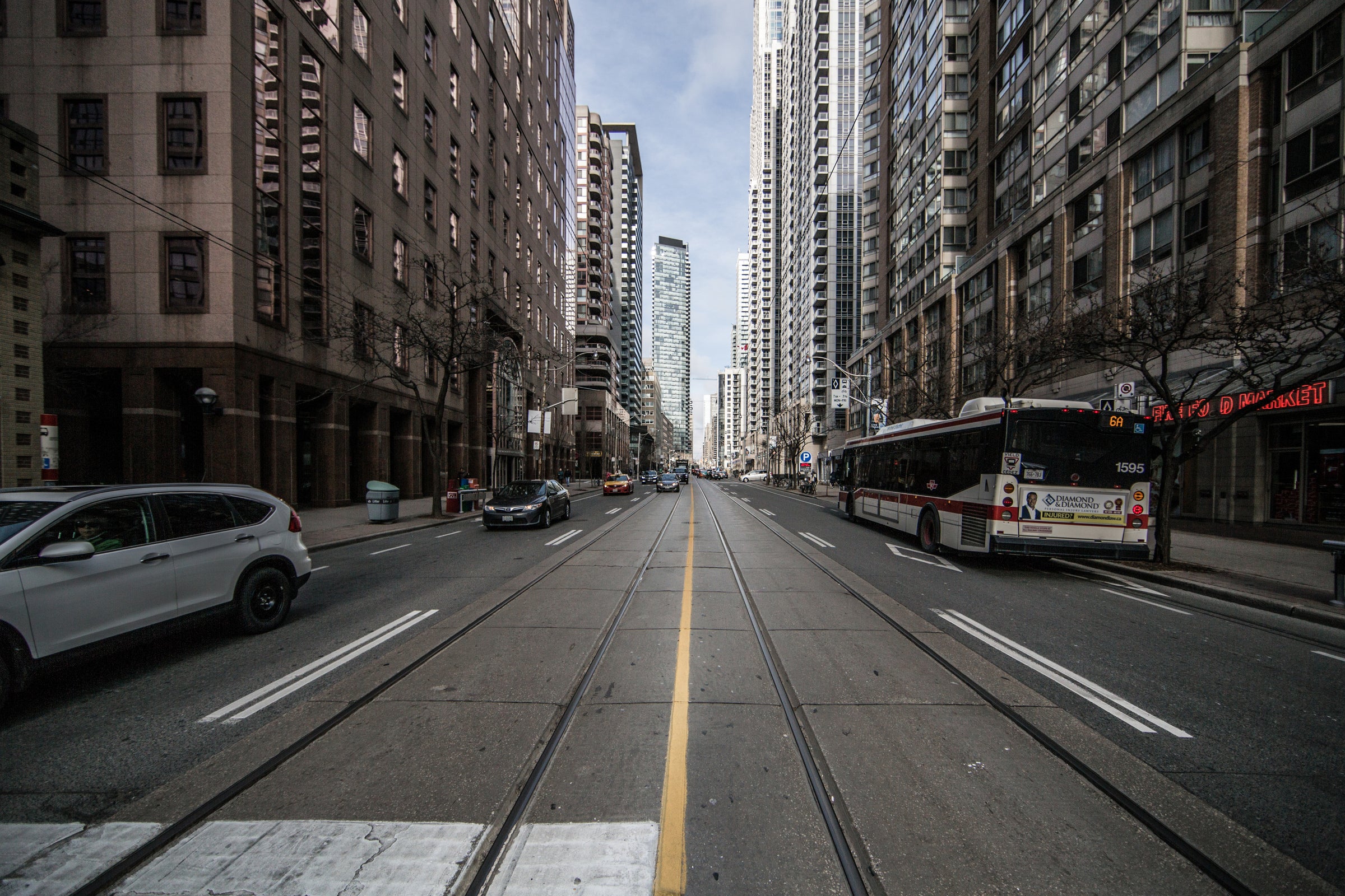 Toronto urban street with buses and cars